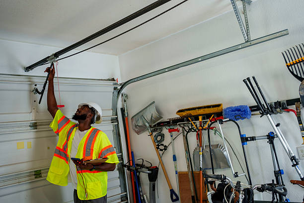 Professional Garage Door Panel Replacement technician working in DeKalb County County, MO